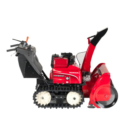 Spazzaneve Honda HSM 1380i visto di lato, progettato per garantire prestazioni elevate nella rimozione della neve. shopdacanal.com.